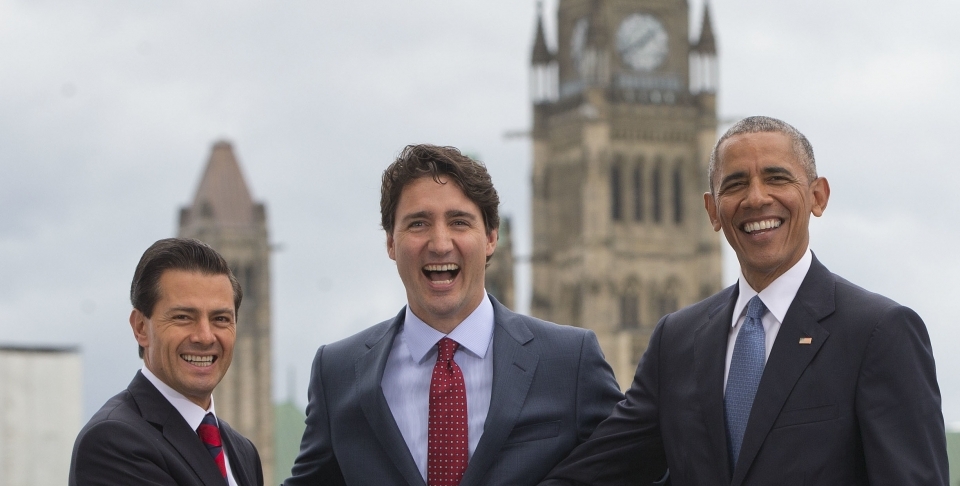 US President Barack Obama, Canadian Prime Minister Justin Trudeau and Mexican President Enrique Pena Neito in front of Parliament Hill on Wednesday, June 29, 2016. (AP Photo/Pablo Martinez Monsivais)