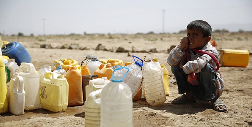 A boy waits for his turn to fill buckets with water from a public tap amid an acute shortage of water, on the outskirts of Sanaa, Yemen, Tuesday, Oct. 13, 2015. The war has taken a heavy toll on Yemen. More than 4,000 people have been killed, and the humanitarian crisis has left the impoverished country on the brink of famine. (AP Photo/Hani Mohammed)