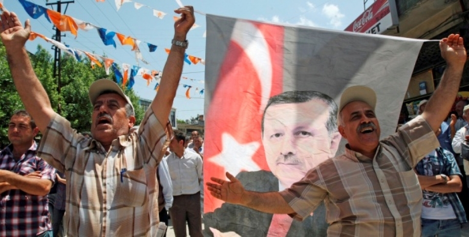 Turks celebrate the re-election of Prime Minister Recep Tayyip Erdogan in June 2011. (AP Photo/Burhan Ozbilici)