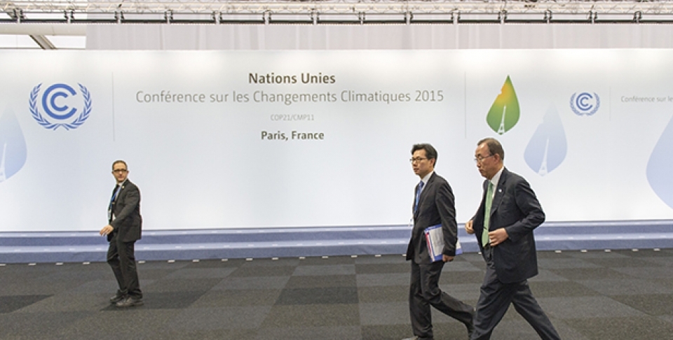 Secretary-General Ban Ki-moon (right) between meetings during the UN Climate Change Conference in Paris (COP 21), on November 30, 2015. (UN Photo/Rick Bajornas)