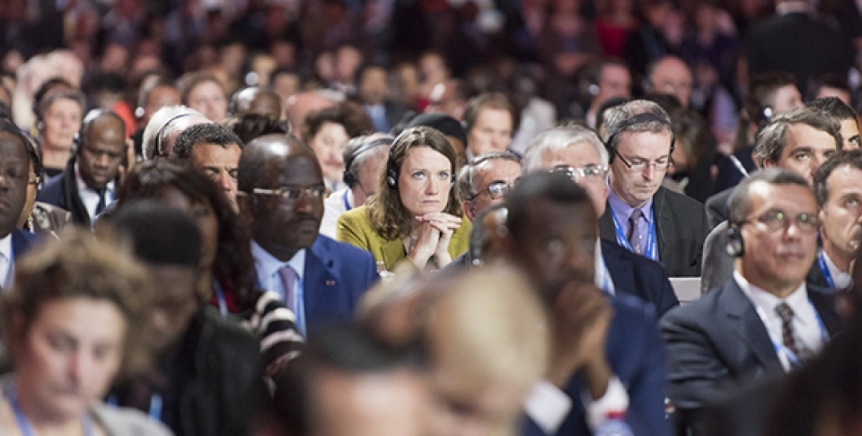 A shot from the “Comité de Paris”: Presentation of Draft Outcome Document at the UN Climate Change Conference in Paris, December 12, 2015. (UN Photo/ Mark Garten)