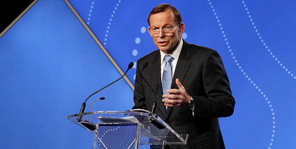 Australian Prime Minister Tony Abbott delivers his keynote speech during the B20 Summit in Sydney. (AP Photo/Lisa Maree Williams/Pool)