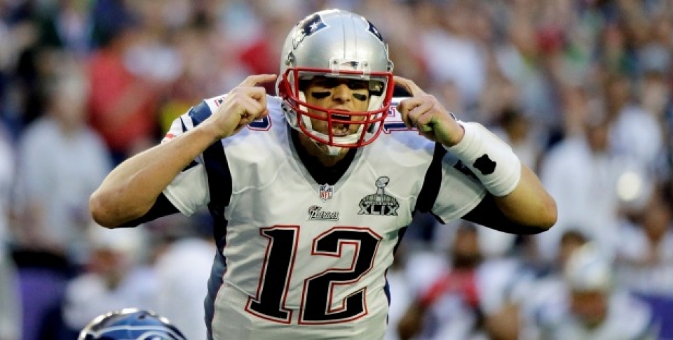 New England Patriots quarterback Tom Brady (12) calls a play against the Seattle Seahawks during the first half of NFL Super Bowl XLIX football game Sunday, Feb. 1, 2015, in Glendale, Ariz. (AP Photo/David Goldman)