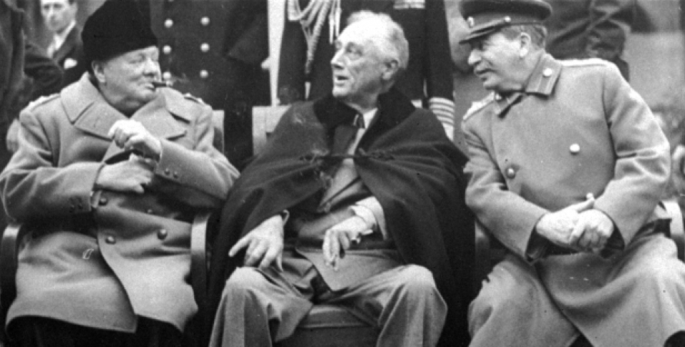 In this Feb.1945 file photo, Prime Minister Winston Churchill, left, meets with President Franklin D. Roosevelt, center, and Russian Marshal Josef Stalin, at the Livadia Palace gardens in Yalta. (AP Photo, File)