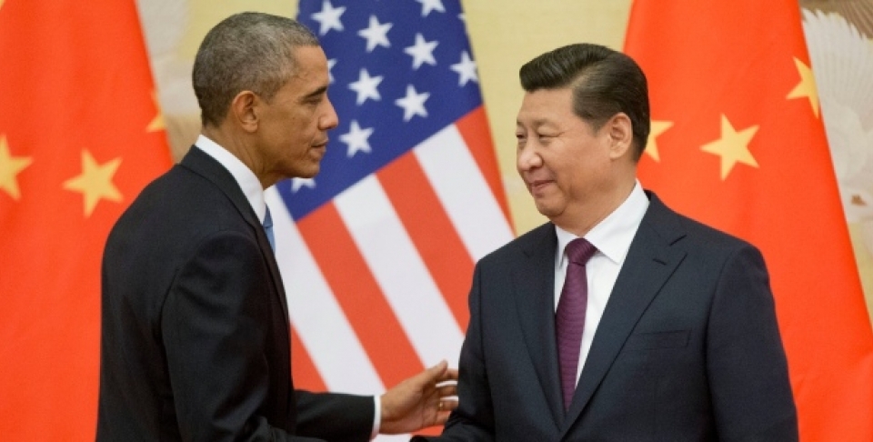U.S. President Barack Obama, left, and Chinese President Xi Jinping shake hands following the conclusion of their joint news conference at the Great Hall of the People in Beijing, Wednesday, Nov. 12, 2014. (AP Photo/Pablo Martinez Monsivais)