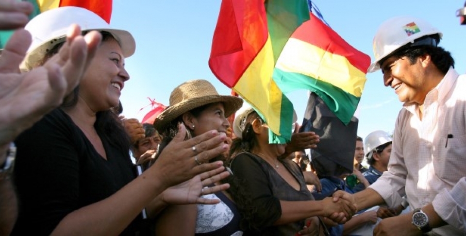 Bolivia's President Evo Morales greets supporters while on a tour around the Rio Grande oil field. (AP Photo/Noah Friedman Rudovsky, HO)