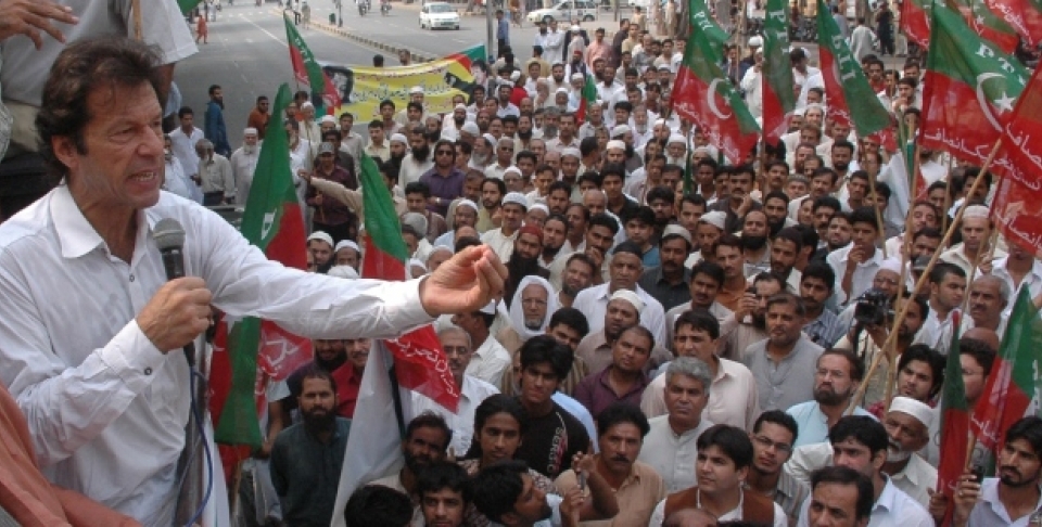 Pakistani cricket hero-turn-politician Imran Khan addresses a crowd in Lahore, Pakistan (AP Photo/K.M.Chaudary).