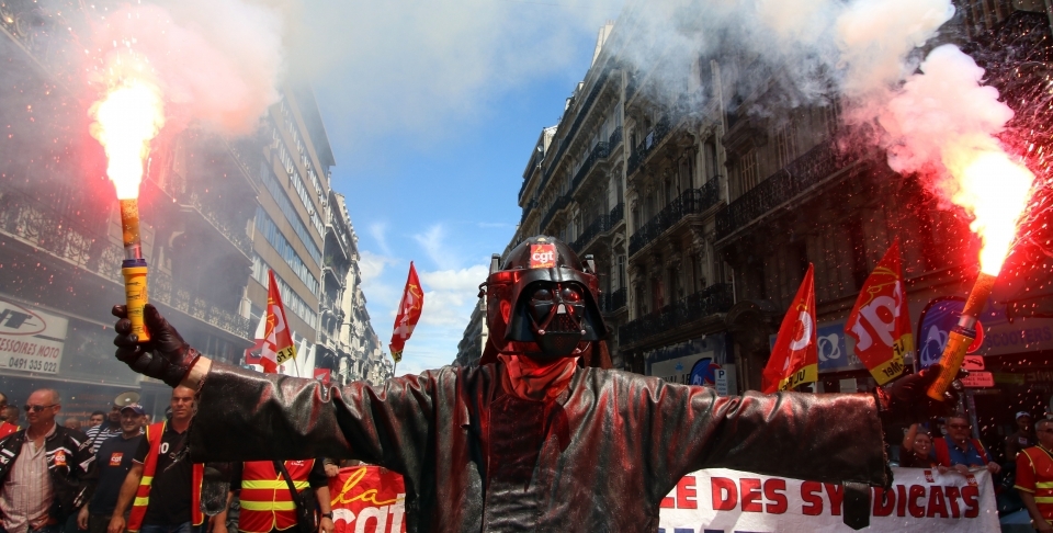 A steelworker in France protests labour reforms