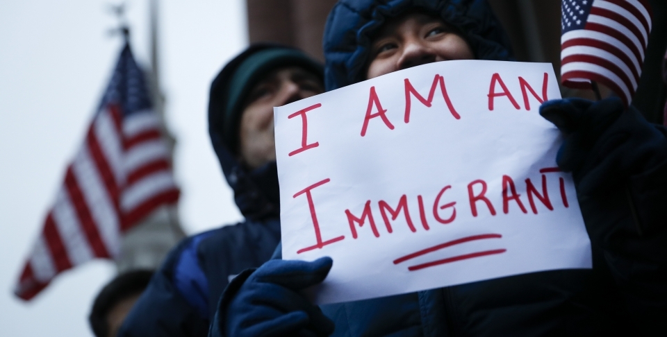 Demonstrators in Cincinnati, where Mayor John Cranley declared a "sanctuary city" (AP Photo/John Minchillo)