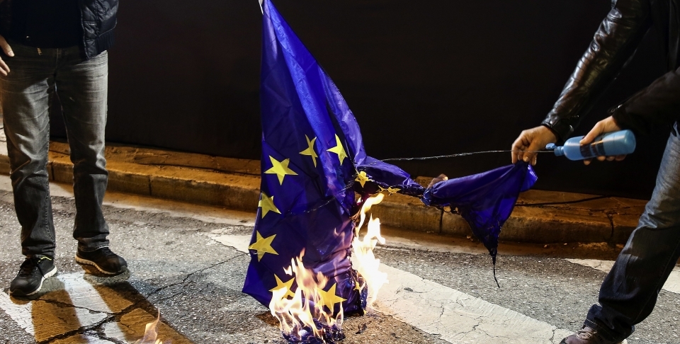 An anti-austerity rally outside an Athens hotel where IMF, EU and Greek officials hold talks (AP Photo/Yorgos Karahalis)