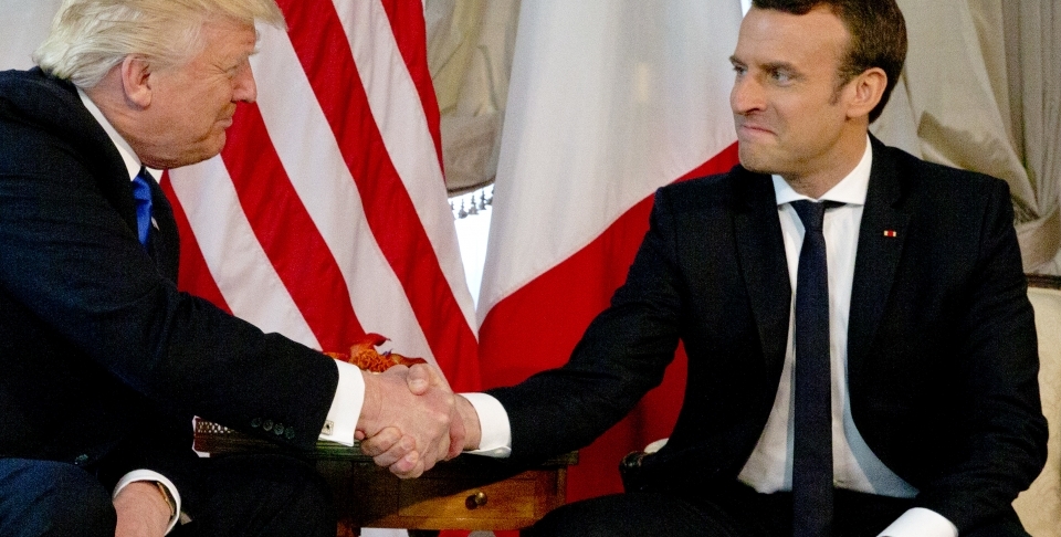 US President Donald Trump shakes hands with French President Emmanuel Macron (AP Photo/Peter Dejong, Pool)