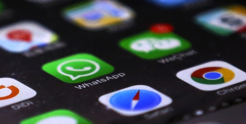 WhatsApp recently set limits on the number of people that a message can be forwarded to: five people in India and 20 everywhere else. (AP Photo/Andy Wong)