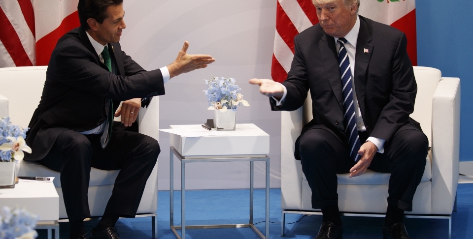 US President Donald Trump meets with Mexican President Enrique Pena Nieto at the G20 Summit, in Hamburg, July 7, 2017 (AP Photo/Evan Vucci, File)