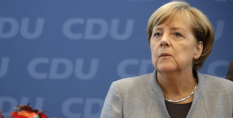 German Chancellor Angela Merkel looks on prior to a meeting of the CDU in Berlin. (AP Photo/Matthias Schrader)