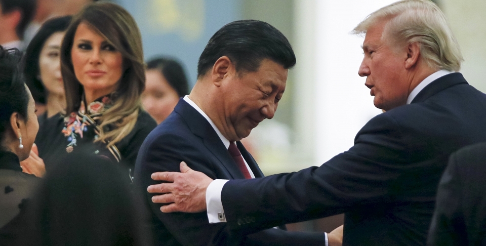China's President Xi Jinping and President Donald Trump and first lady Melania Trump attend a state dinner at the Great Hall of the People in Beijing, China on November 9, 2017. (Thomas Peter/Pool Photo via AP)