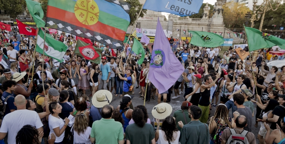 Activists from grassroots organizations chant slogans against free trade and the World Trade Organization conference, in Buenos Aires, Argentina. (AP Photo/Victor R. Caivano)