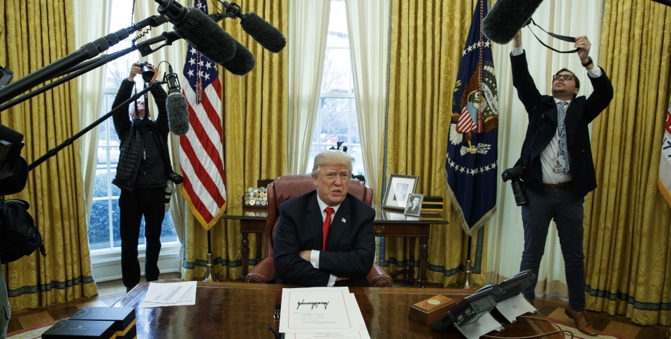 President Donald Trump signed the tax bill and the continuing resolution to fund the government on Friday, Dec. 22, 2017 in Washington. (AP Photo/Evan Vucci)