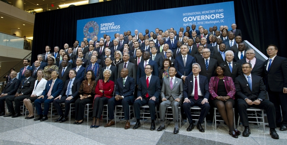 International Monetary Fund (IMF) Governors gather for a group photo during World Bank/IMF Spring Meetings in Washington on April 21, 2018. ( AP Photo/Jose Luis Magana)