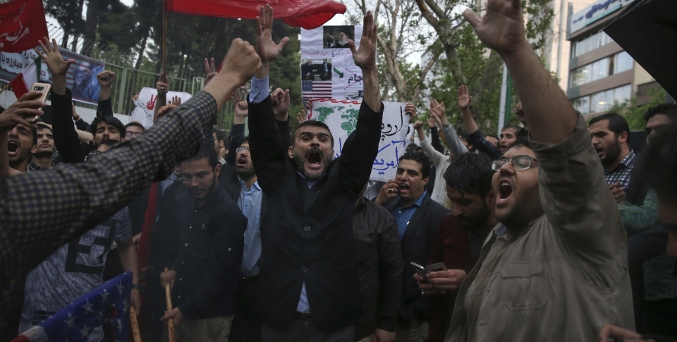 Iraninan demonstrators chant slogans following President Donald Trump's decision to pull out of the nuclear deal and renew sanctions on Iran (AP Photo/Vahid Salemi)
