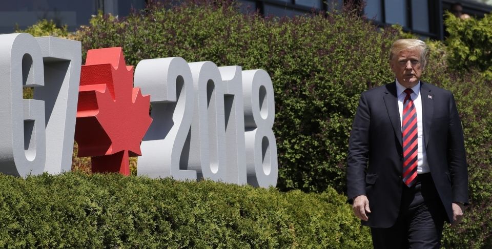 President Donald Trump arrives to participate in the G7 Summit welcome ceremony, on June 8, 2018, in Charlevoix, Canada. (AP Photo/Evan Vucci)