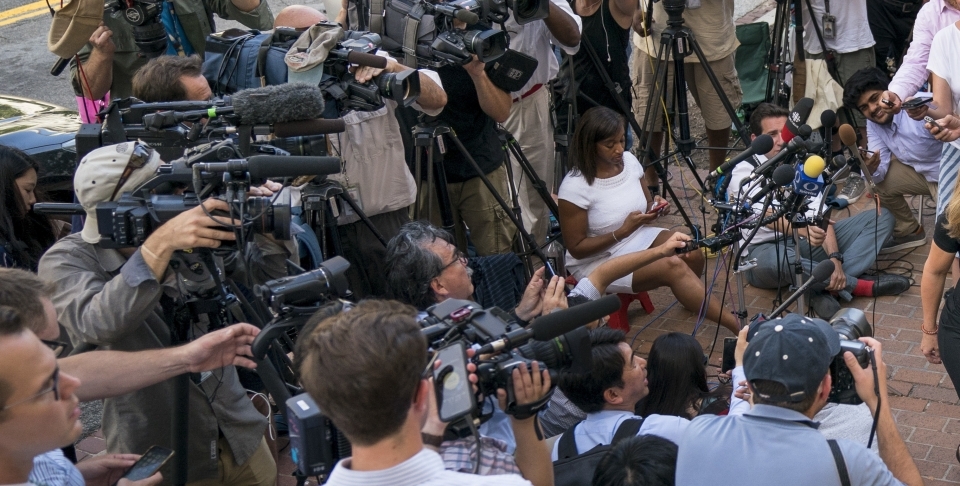 Reporters at the Office of the United States Trade Representative in Washington. (AP Photo/Andrew Harnik)