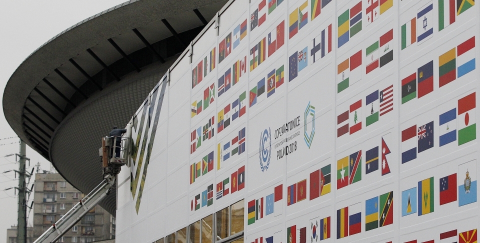 Workers decorate the venue of the global climate summit that will be held at the site of a closed coal mine in Katowice, Poland. (AP Photo/Czarek Sokolowski)