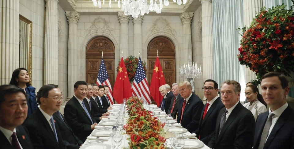 US President Donald Trump with China's President Xi Jinping and members of their official delegations during their bilateral meeting at the G20 Summit, December 1, 2018 in Buenos Aires, Argentina. (AP Photo/Pablo Martinez Monsivais)