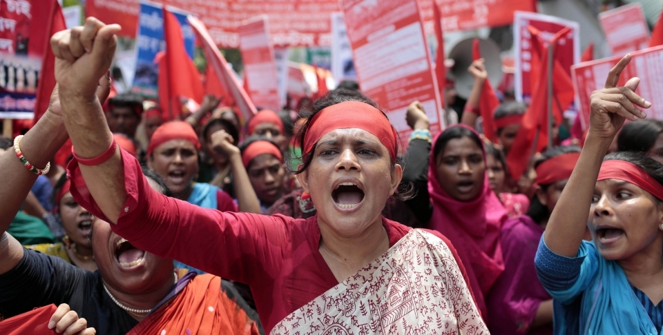 Garment workers and activists shout slogans during a May Day rally in Dhaka, Bangladesh. (AP Photo/A.M. Ahad)