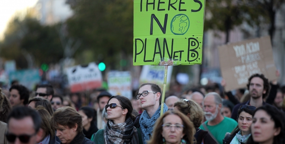 Rallies were organized around the world on Sunday, calling on all government leaders to halt climate change on the eve of a major conference in Paris. (AP Photo/Armando Franca)
