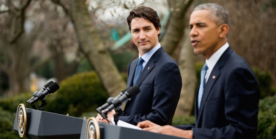 Canadian Prime Minister Justin Trudeau listens as President Barack Obama speaks during a bilateral news conference in the Rose Garden of the White House in Washington, March 10, 2016. (AP Photo/Andrew Harnik)