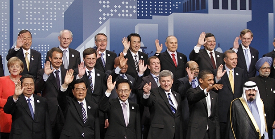World leaders wave during a group photo at the G20 Summit in Toronto, 2010. (Lefteris Pitarakis, AP Images)