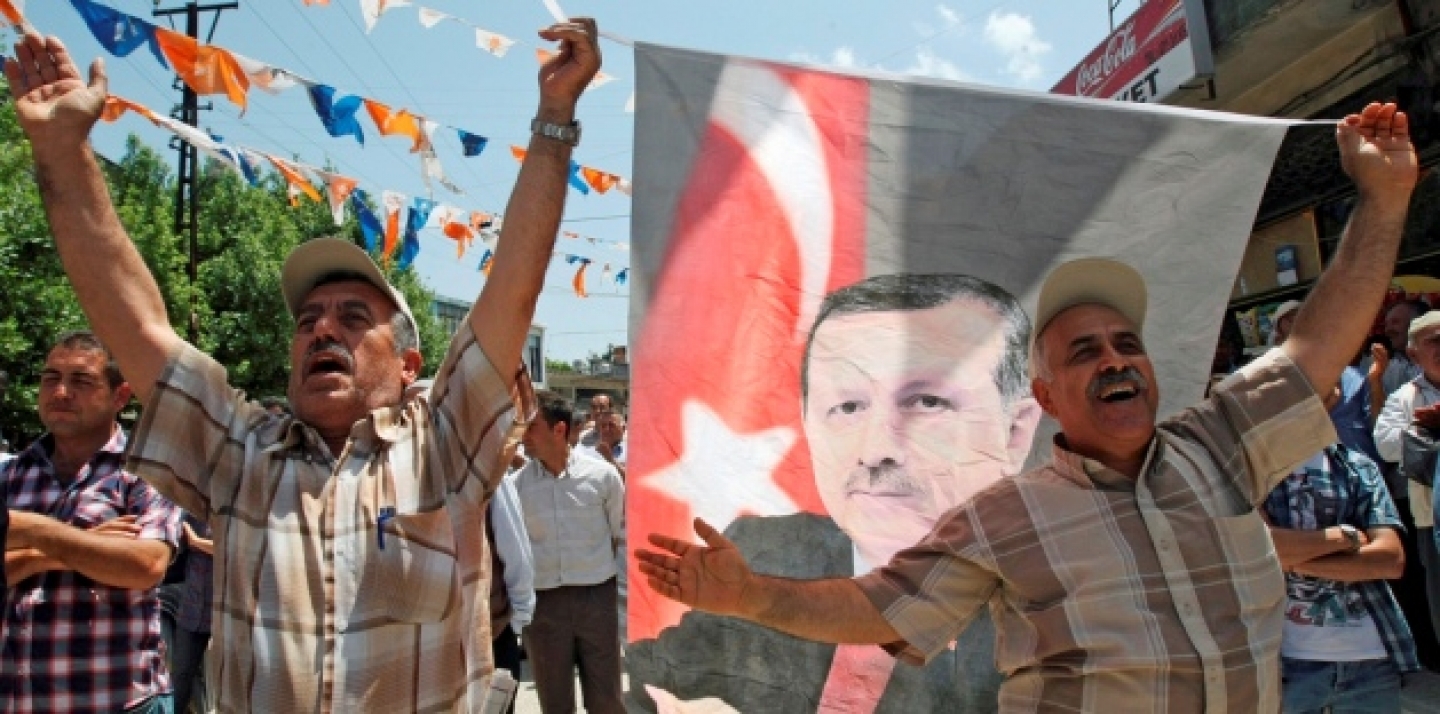 Turks celebrate the re-election of Prime Minister Recep Tayyip Erdogan in June 2011. (AP Photo/Burhan Ozbilici)