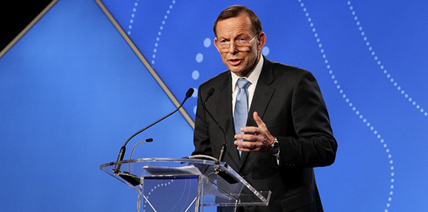 Australian Prime Minister Tony Abbott delivers his keynote speech during the B20 Summit in Sydney. (AP Photo/Lisa Maree Williams/Pool)