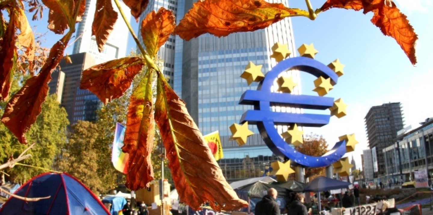 Tents are set up by the ' Occupy Frankfurt' movement in front of the European Central Bank and the euro sign in Frankfurt, Germany, Oct. 26, 2011 (AP Photo/Michael Probst).