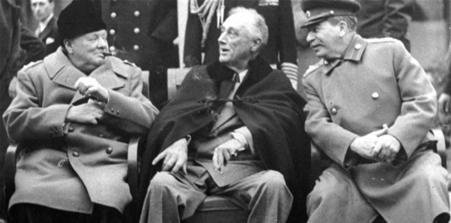 In this Feb.1945 file photo, Prime Minister Winston Churchill, left, meets with President Franklin D. Roosevelt, center, and Russian Marshal Josef Stalin, at the Livadia Palace gardens in Yalta. (AP Photo, File)