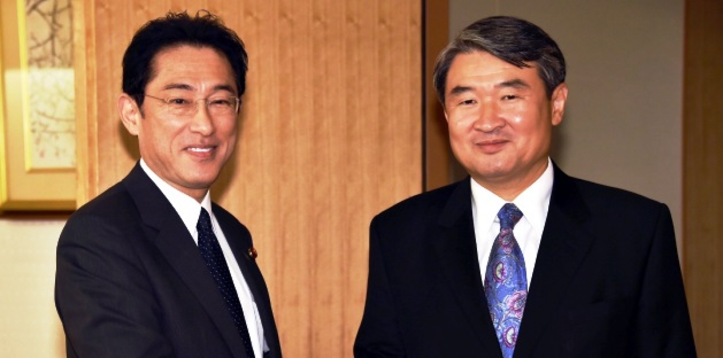 South Korean First Vice Foreign Minister Cho Tae-yong, right, shakes hands with Japanese Foreign Minister Fumio Kishida prior to their talks at Foreign Ministry in Tokyo Thursday, Oct. 2, 2014. (AP Photo/Yoshikazu Tsuno, Pool)