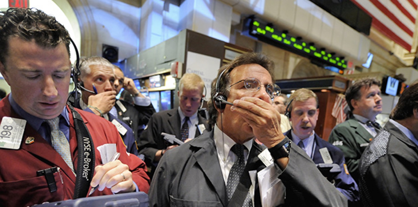 Traders work on the New York Stock Exchange floor, Monday Oct. 6, 2008. (AP Photo/Richard Drew)
