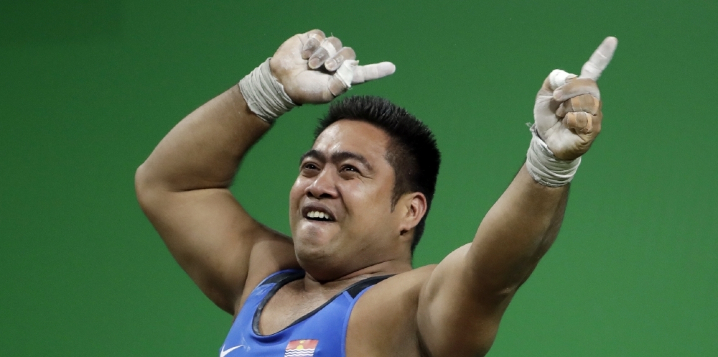 David Katoatau, of Kiribati, dances after a successful lift in the men's 105 kg weightlifting event at the 2016 Summer Olympics in Rio de Janeiro, Brazil, Monday, Aug. 15, 2016. (AP Photo/Mike Groll)