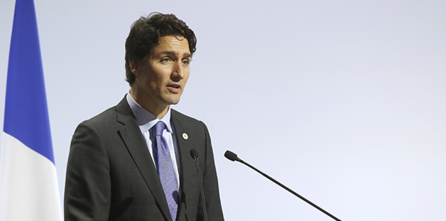 Canadian Prime Minister Justin Trudeau addresses world leaders at the COP21, United Nations Climate Change Conference, in Le Bourget, outside Paris, Monday, Nov. 30, 2015. (AP Photo/Michel Euler)
