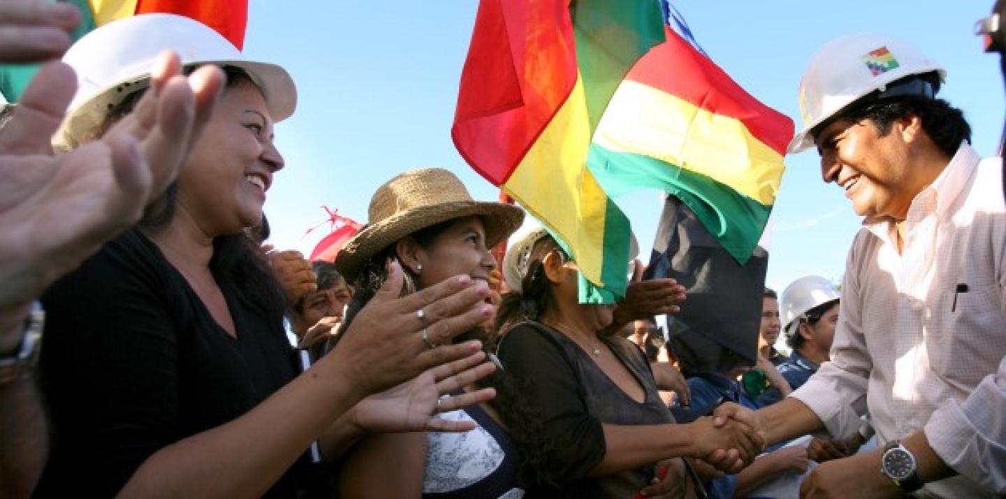 Bolivia's President Evo Morales greets supporters while on a tour around the Rio Grande oil field. (AP Photo/Noah Friedman Rudovsky, HO)