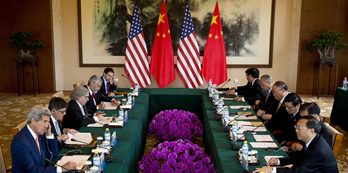 U.S. Secretary of State John Kerry, left, and U.S. Treasury Secretary Jack Lew, second left, attend a joint session on Climate Change issues with Chinese officials. (AP Photo/Andy Wong, Pool)