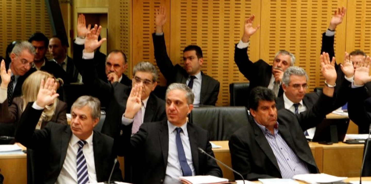 Cyprus lawmakers vote on key bills aimed at securing a broader bailout package from international creditors in parliament in capital Nicosia, Cyprus, late Friday, March 22, 2013. (AP Photo/Petros Karadjias)