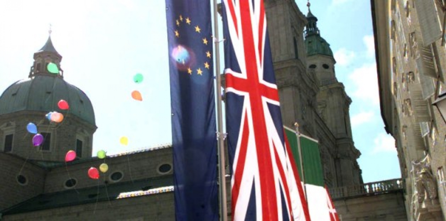The European Union and United Kingdom flags are seen in Salzburg's Residenzplatz (AP Photo/Rudi Blaha.)