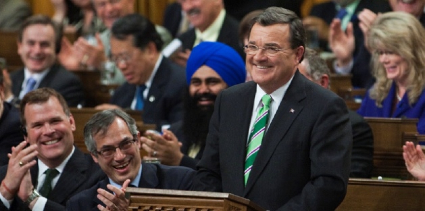 Jim Flaherty, Minister of Finance, stands in the House of Commons before tabling Budget 2011: The Next Phase of Canada's Economic Action Plan. (Stephen Harper staff photo via Flickr CC)