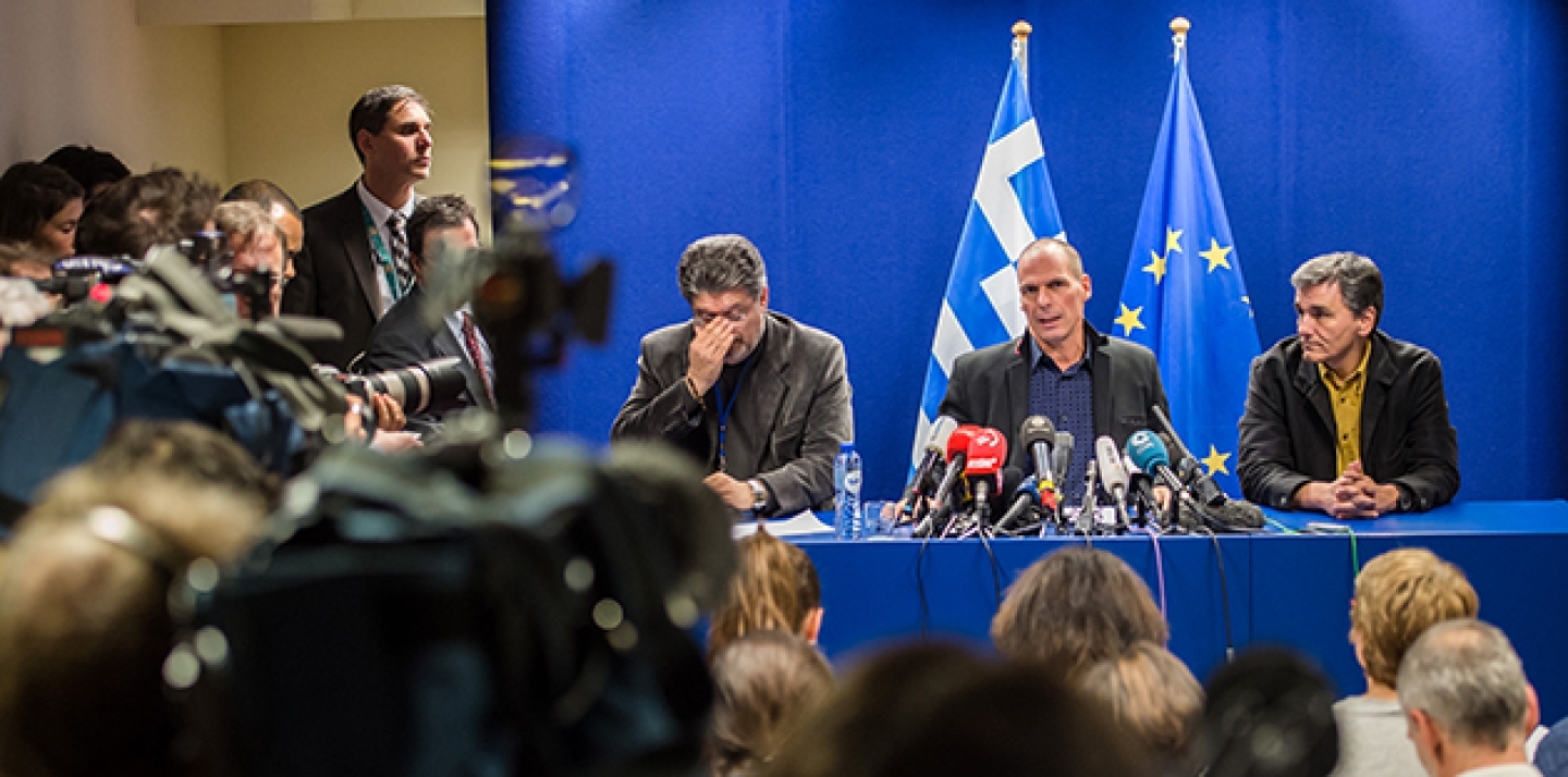 Greece's Finance Minister Yanis Varoufakis, second from right, addresses the media after a meeting of Eurogroup finance ministers at the EU Council building in Brussels on Monday, Feb. 16, 2015. (AP Photo/Geert Vanden Wijngaert)