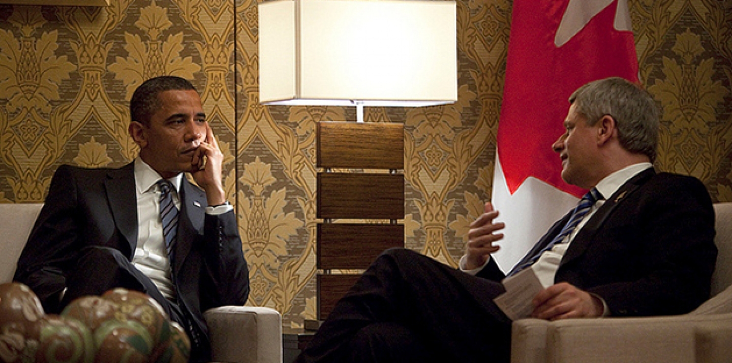 U.S. President Barack Obama and Canadian Prime Minister Stephen Harper speak on the first day of the G8 conference in Deerhurst, 2010. (Stephen Harper Photo via Flickr CC)