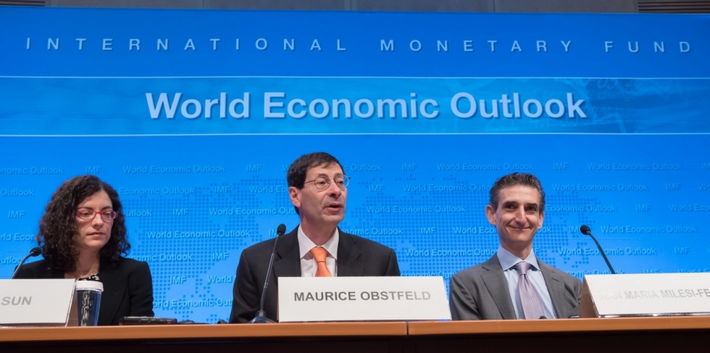 Maurice Obstfeld (center), IMF Economic Counsellor and Director of the Research Department, along with Oya Celasun (left) and Gian Maria Milesi-Ferretti, give remarks to the media during the World Economic Outlook press conference during the 2016 IMF Spring Meetings on Tuesday, April 12 in Washington, D.C. (Ryan Rayburn/IMF Photo)