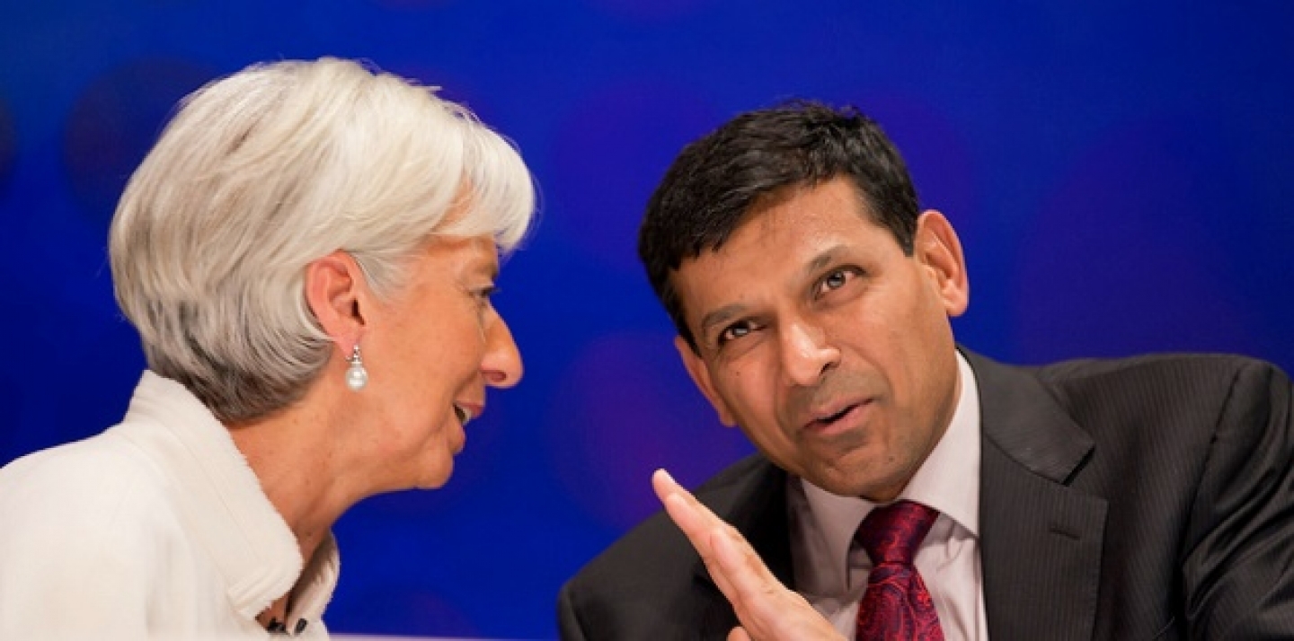 Christine Lagarde and Raghuram Rajan talk to each other after the 2012 BBC World Debate in Toyko, Japan. (IMF Staff Photograph/Stephen Jaffe)