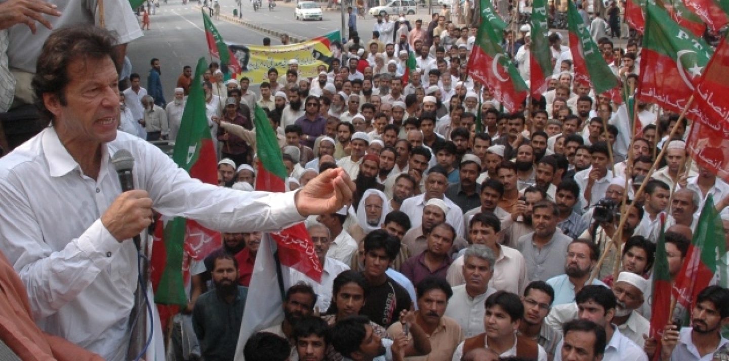 Pakistani cricket hero-turn-politician Imran Khan addresses a crowd in Lahore, Pakistan (AP Photo/K.M.Chaudary).