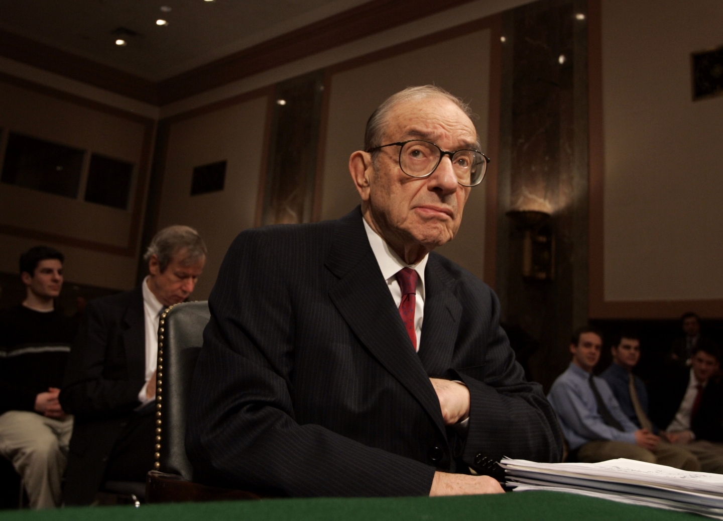 Federal Reserve Chariman Alan Greenspan pauses before the start of a Senate Banking Committee hearing on February 16, 2005 in Washington. (AP Photo/Evan Vucci)